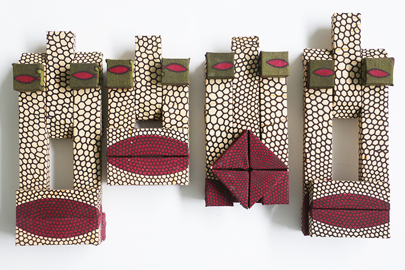 Bele, 2016 | Dutch-Wax printed fabric on wood, 15" x 27" x 3"